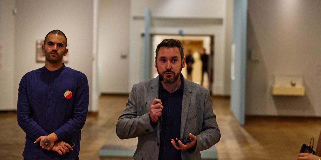 Two of the curators, Edwin Nasr and Arnaud Quertinmont, in the exhibition